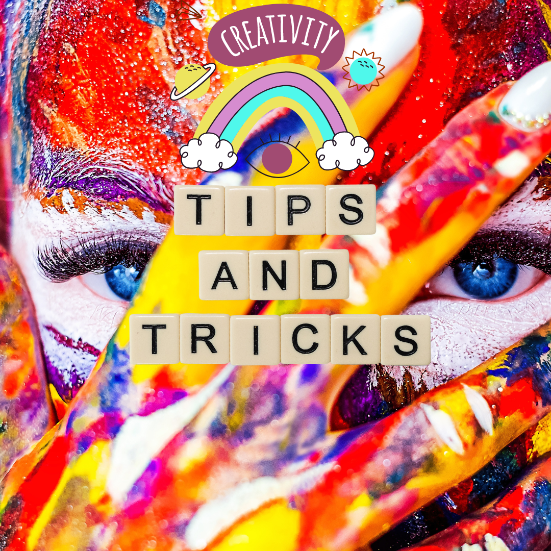 a zoom in on a female face covered with multicolor paint symbolizing creativity
