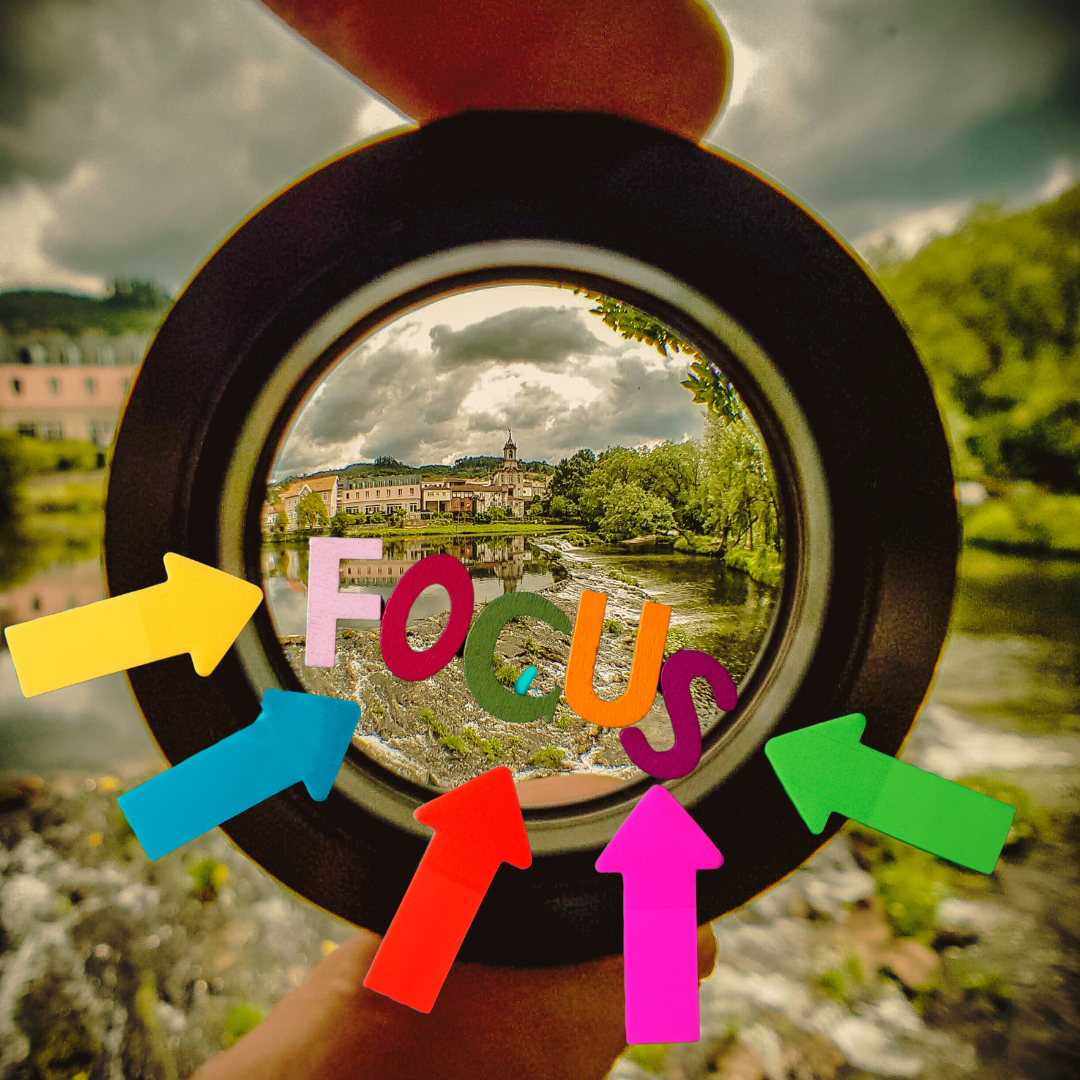 blurry background and the lens from which the one can see sharp image of the landscape